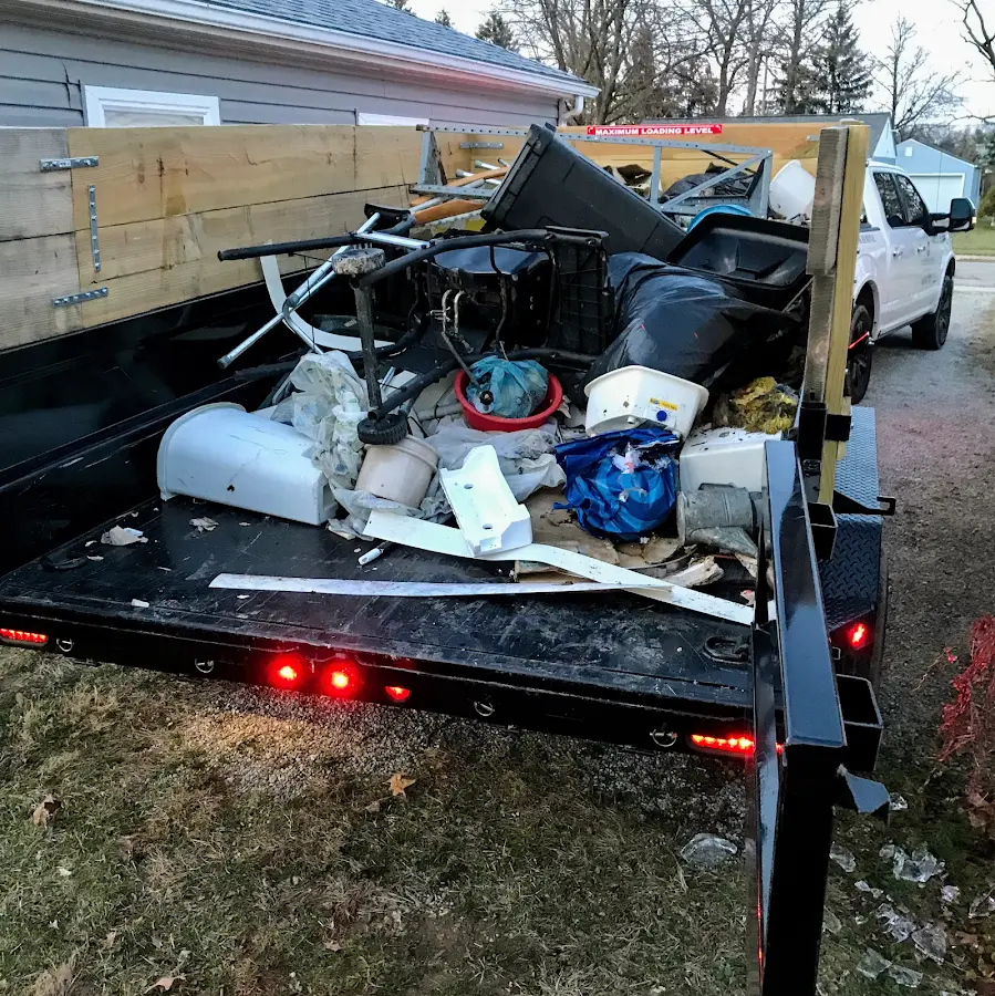 Roll-off dumpster delivered to a residential driveway in North Oaks