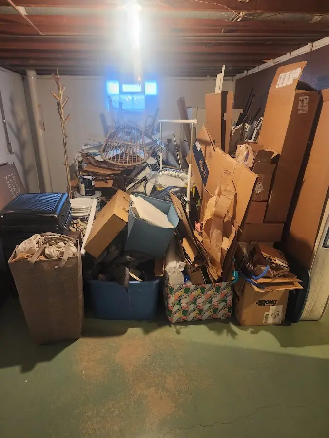 Roll-off dumpster container at job site for 2 Yard Dumpster Rental in North Oaks